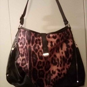 Animal print purse with zippers and adjustable strap
